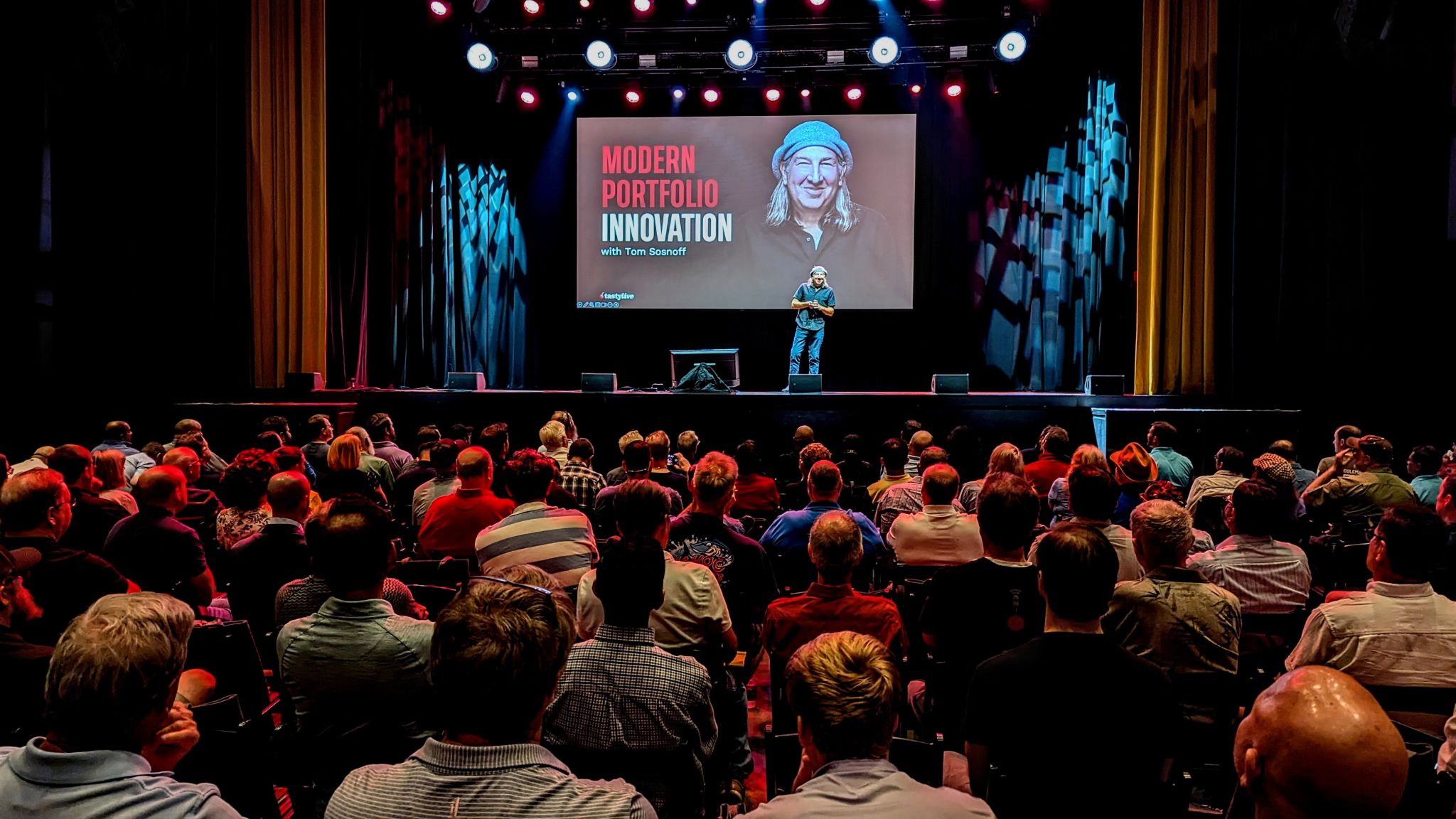 Tom Sosnoff presenting Modern Portfolio Innovation to a packed theater audience